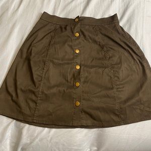 Black skirt with gold buttons